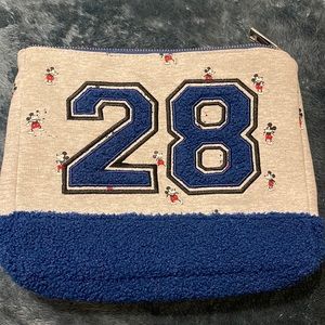 Mickey Mouse “28” zip pouch. Gray with blue fleece on bottom.